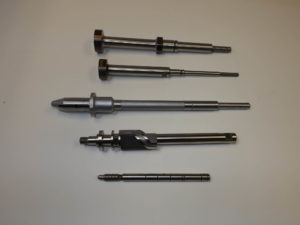 Shafts and piston rods made from 450 custom, 4340 and 440 stainless. Heat treated and ground with Acme thread.