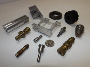 Various machined components. Aluminum, brass, beryllium copper, 440 and 303 stainless and 4110 hardened, ground and copper plated.
