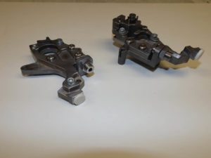 Precision machined 440 C castings. Induction hardened, surface ground and assembled.